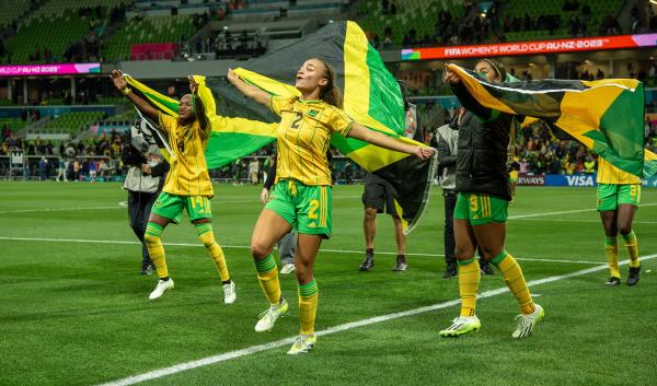 Jamaica celebrate qualifying for the round of sixteen. 